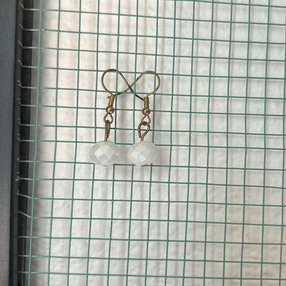 Little white earrings